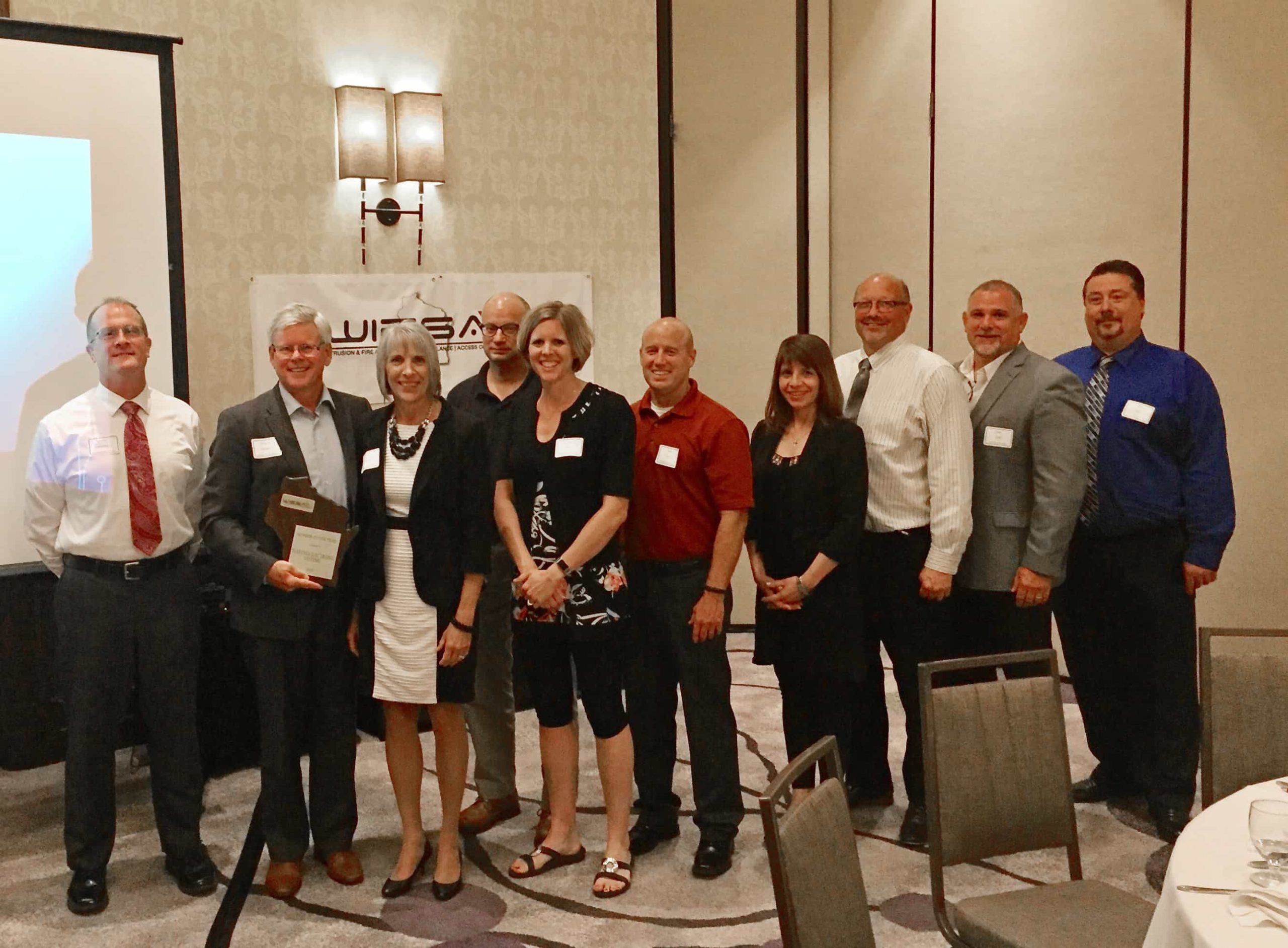 Photo of Fearing's team accepting the Fearing's Named Member of the Year by Wisconsin Electronic Security Association