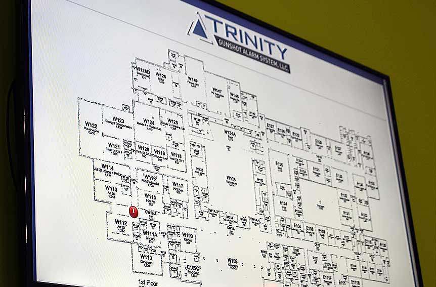 Photo of building plans on a computer monitor. Gunshot detection technology installed by Fearing's AVS can pin point the exact location of the incident. Call today.