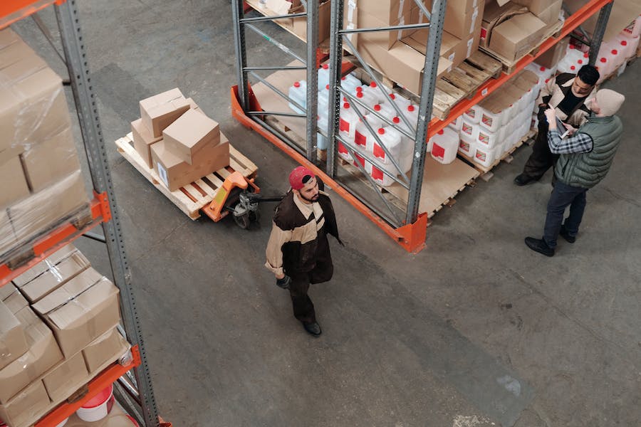 An overhead image of people working in a warehouse.