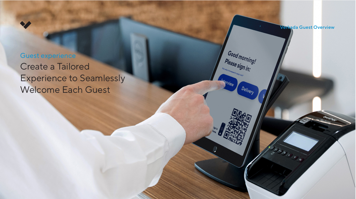 A person using a visitor management software for a business